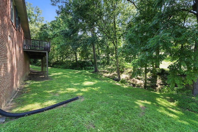 144 Waggoner St, Carthage, TN 37030 - view of grassy yard featuring a wooden deck
