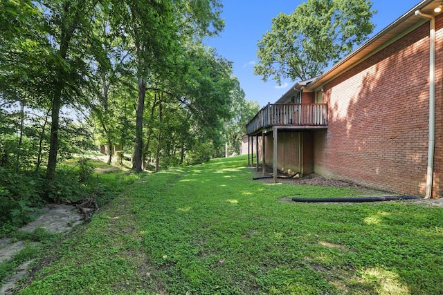 144 Waggoner St, Carthage, TN 37030 - view of grassy yard with a wooden deck