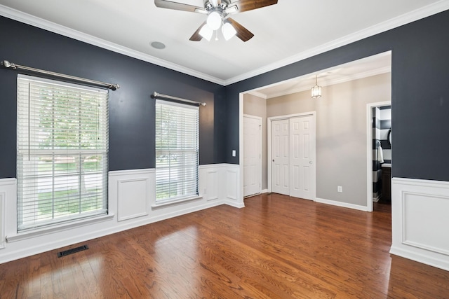 6014 Thrush Ct, Spring Hill, TN 37174 - empty room with wainscoting, a ceiling fan, wood finished floors, and crown molding