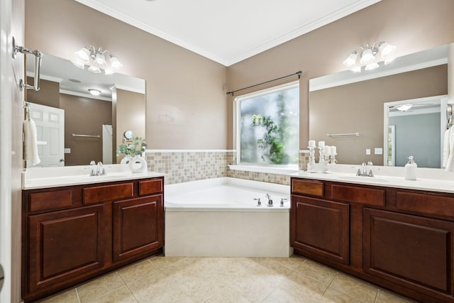 6014 Thrush Ct, Spring Hill, TN 37174 - bathroom with two vanities, ornamental molding, a bath, and tile patterned flooring