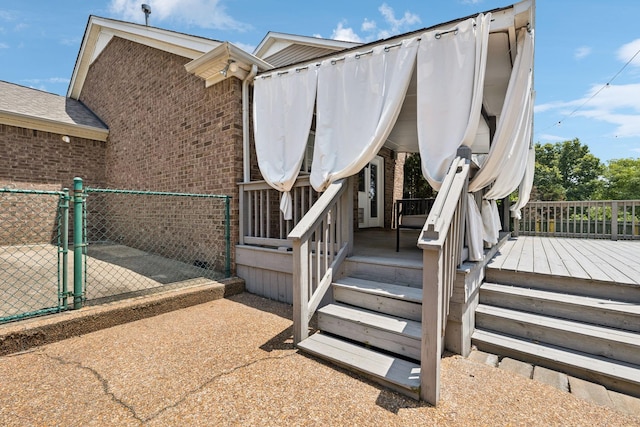 6014 Thrush Ct, Spring Hill, TN 37174 - view of home's exterior with a gate and brick siding