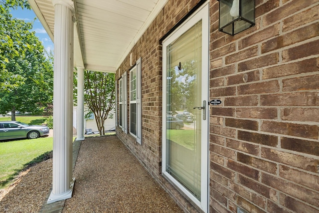 6014 Thrush Ct, Spring Hill, TN 37174 - property entrance with a porch and brick siding