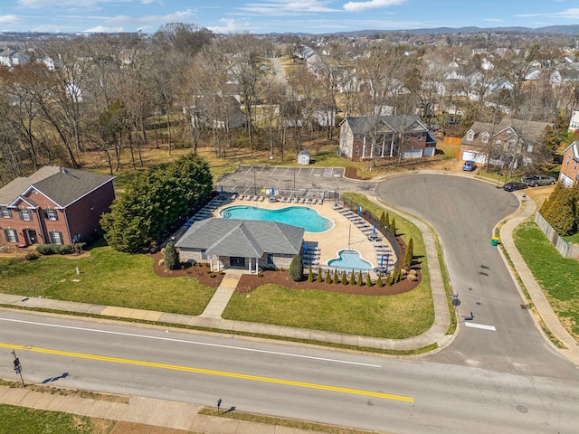 6014 Thrush Ct, Spring Hill, TN 37174 - aerial view of residential area featuring a pool and a tree filled landscape