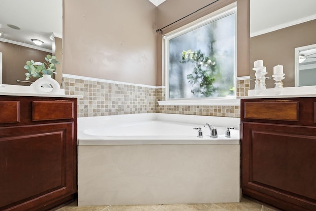 6014 Thrush Ct, Spring Hill, TN 37174 - bathroom with vanity, a bath, and ornamental molding