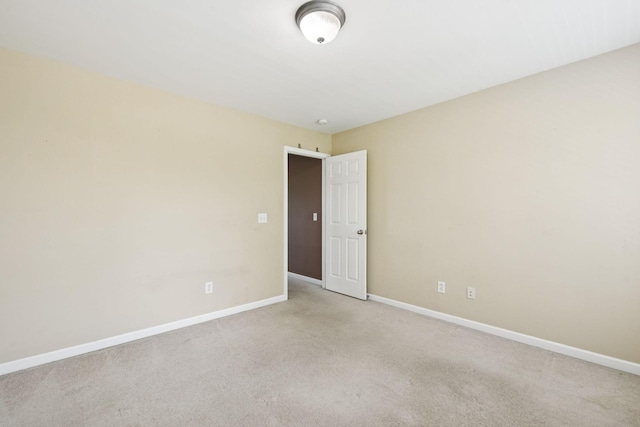 6014 Thrush Ct, Spring Hill, TN 37174 - unfurnished room with baseboards and light carpet