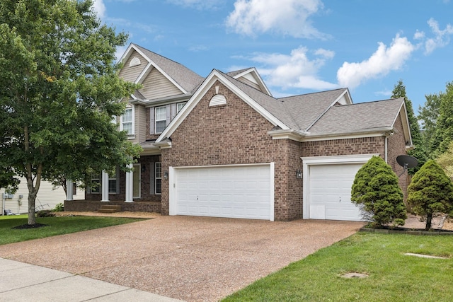 6014 Thrush Ct, Spring Hill, TN 37174 - view of front of property featuring driveway, brick siding, and a front yard