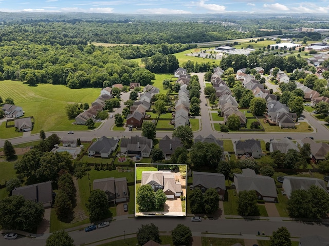 6014 Thrush Ct, Spring Hill, TN 37174 - aerial perspective of suburban area with property parcel outlined and a forest