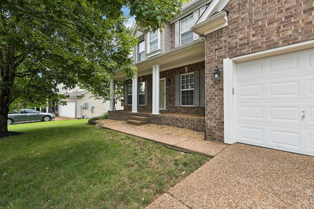 6014 Thrush Ct, Spring Hill, TN 37174 - view of front of home featuring brick siding, a front lawn, a porch, a garage, and driveway