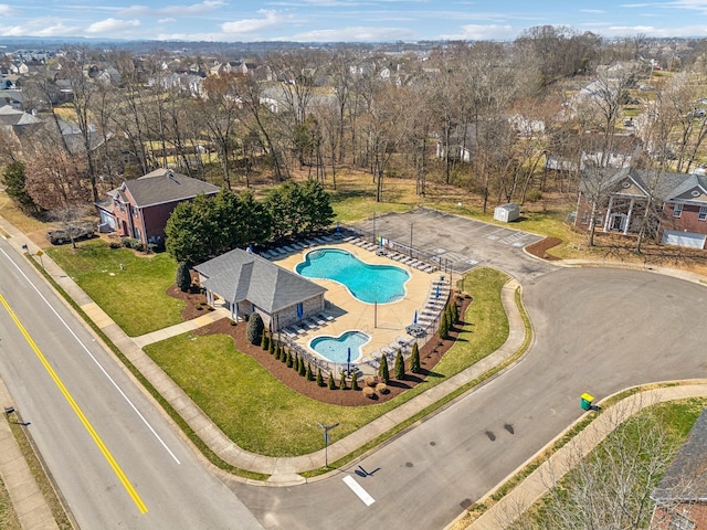 6014 Thrush Ct, Spring Hill, TN 37174 - drone / aerial view of a pool area and a tree filled landscape