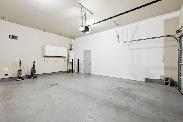 6014 Thrush Ct, Spring Hill, TN 37174 - garage featuring a garage door opener