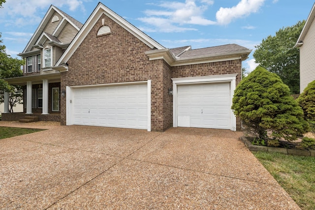 6014 Thrush Ct, Spring Hill, TN 37174 - view of front of property with brick siding, a garage, and concrete driveway