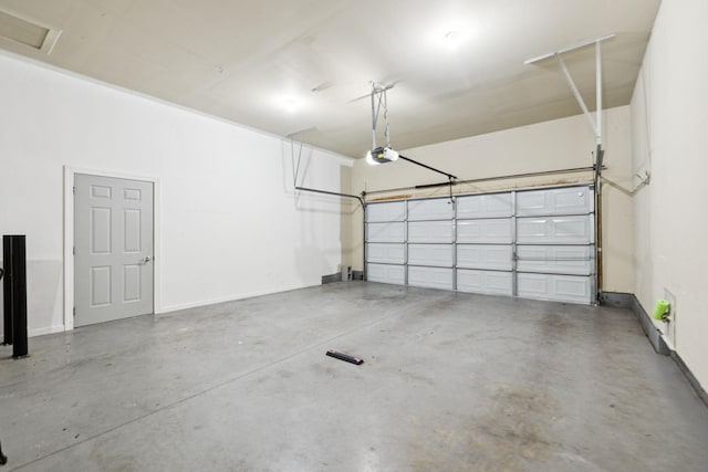 6014 Thrush Ct, Spring Hill, TN 37174 - garage with a garage door opener and baseboards