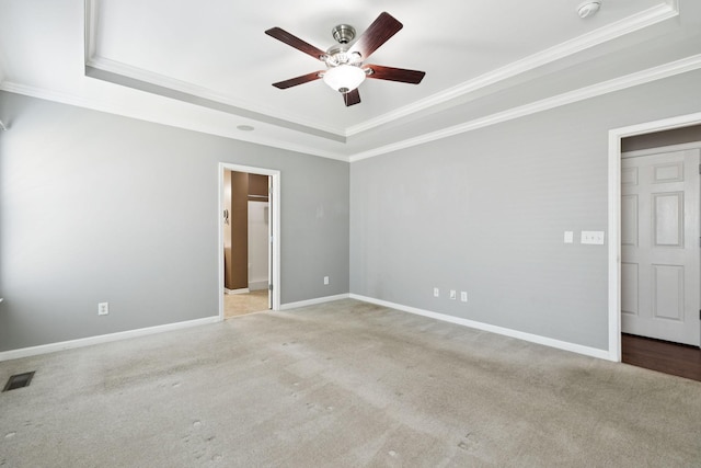 6014 Thrush Ct, Spring Hill, TN 37174 - empty room with a raised ceiling, crown molding, a ceiling fan, carpet flooring, and a smoke detector