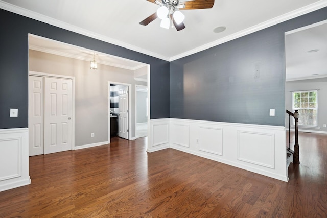 6014 Thrush Ct, Spring Hill, TN 37174 - spare room with a ceiling fan, dark wood finished floors, a wainscoted wall, and crown molding