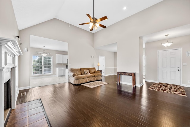 3162 Cross Ridge Dr, Clarksville, TN 37040 - living room with hardwood / wood-style floors, a ceiling fan, a fireplace, and high vaulted ceiling