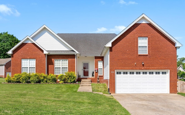 3162 Cross Ridge Dr, Clarksville, TN 37040 - traditional home featuring brick siding, a garage, driveway, a front yard, and a shingled roof