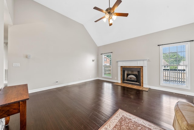 3162 Cross Ridge Dr, Clarksville, TN 37040 - unfurnished living room featuring high vaulted ceiling, healthy amount of natural light, a ceiling fan, a tile fireplace, and wood finished floors