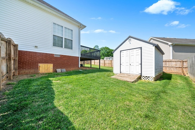 3162 Cross Ridge Dr, Clarksville, TN 37040 - fenced backyard with a storage shed and a wooden deck