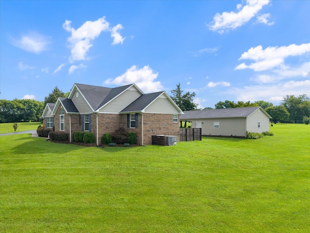 305 Davis Green Ln, Spring Hill, TN 37174 - view of side of property featuring a yard and brick siding