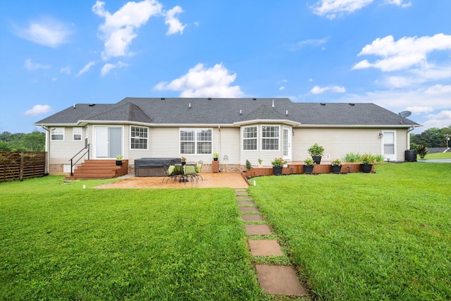 305 Davis Green Ln, Spring Hill, TN 37174 - back of property featuring a hot tub, a patio, and roof with shingles