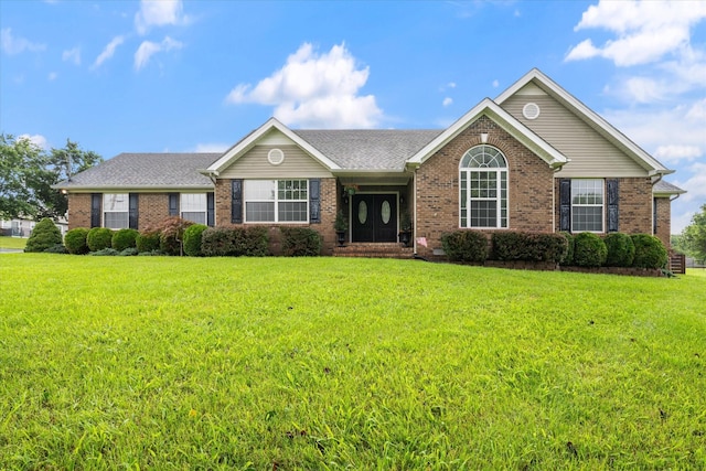 305 Davis Green Ln, Spring Hill, TN 37174 - ranch-style home with brick siding and a front yard