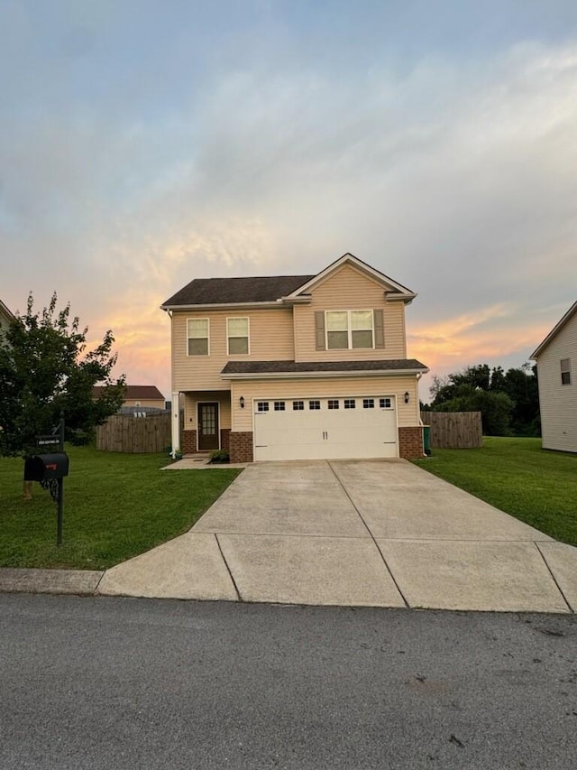 6005 Sentinel Dr, Spring Hill, TN 37174 - view of front of property with an attached garage, driveway, and brick siding
