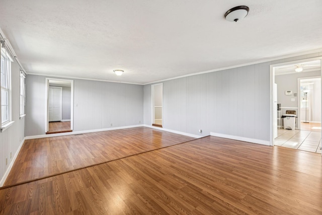 810 Country Club Dr, Clarksville, TN 37043 - unfurnished living room featuring wood finished floors and ornamental molding