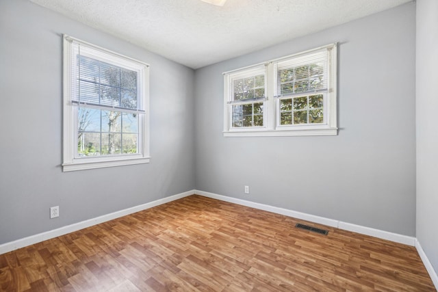 810 Country Club Dr, Clarksville, TN 37043 - unfurnished room featuring wood finished floors and a textured ceiling