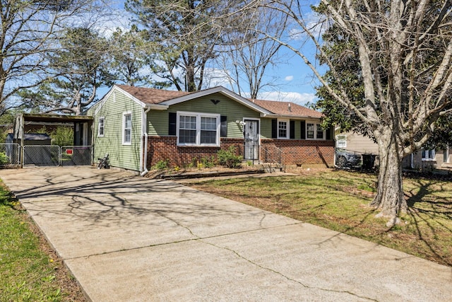 810 Country Club Dr, Clarksville, TN 37043 - view of front of house with driveway and brick siding