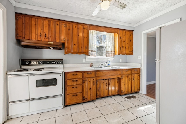 810 Country Club Dr, Clarksville, TN 37043 - kitchen featuring white appliances, under cabinet range hood, light countertops, brown cabinetry, and ornamental molding