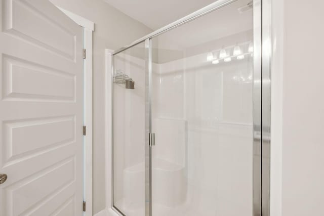 7026 Magnolia Crossings, Spring Hill, TN 37174 - full bathroom featuring a stall shower
