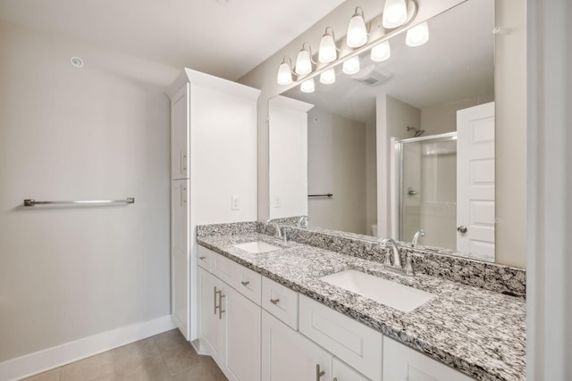 7026 Magnolia Crossings, Spring Hill, TN 37174 - full bath with a shower stall, double vanity, and tile patterned floors
