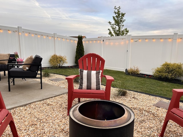 1000 June Wilde Rdg, Spring Hill, TN 37174 - fenced backyard with a patio area and a fire pit