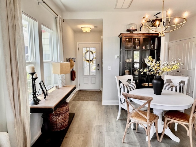 1000 June Wilde Rdg, Spring Hill, TN 37174 - dining space with a chandelier and wood finished floors