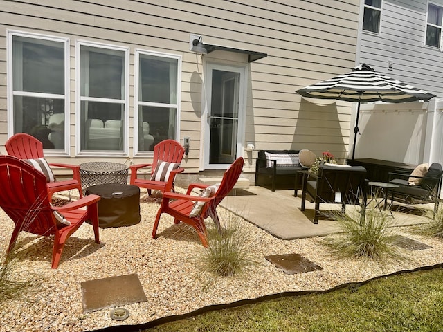 1000 June Wilde Rdg, Spring Hill, TN 37174 - view of patio / terrace featuring an outdoor living space with a fire pit