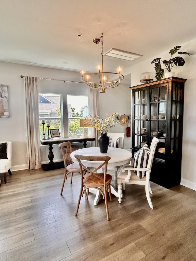 1000 June Wilde Rdg, Spring Hill, TN 37174 - dining area with light wood finished floors and a chandelier