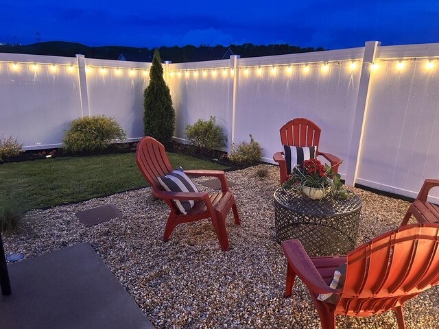 1000 June Wilde Rdg, Spring Hill, TN 37174 - patio at night featuring a yard and a patio area
