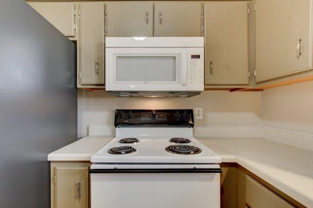 421 Woodale Dr, Clarksville, TN 37042 - kitchen with white appliances and light countertops