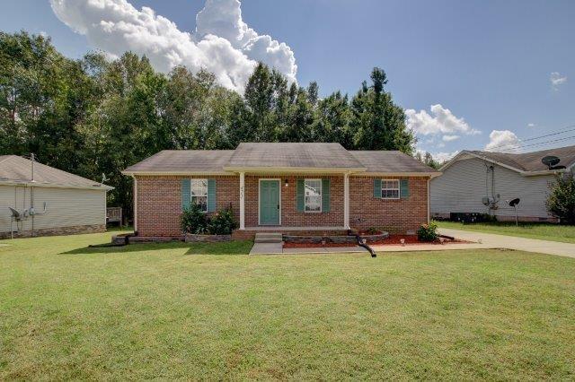 421 Woodale Dr, Clarksville, TN 37042 - ranch-style home with a front lawn and brick siding