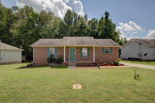 421 Woodale Dr, Clarksville, TN 37042 - single story home with a front lawn and brick siding