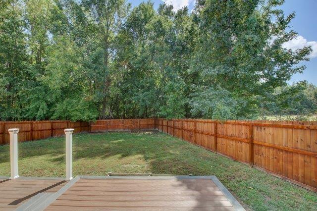 421 Woodale Dr, Clarksville, TN 37042 - fenced backyard with a deck