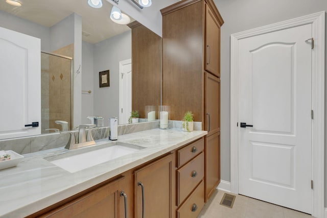 2005 Windsong Dr, Spring Hill, TN 37174 - full bath featuring vanity, tile patterned floors, and a shower