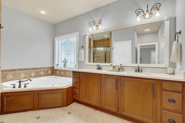 2005 Windsong Dr, Spring Hill, TN 37174 - full bathroom featuring double vanity, a shower stall, tile patterned flooring, and a tub with jets