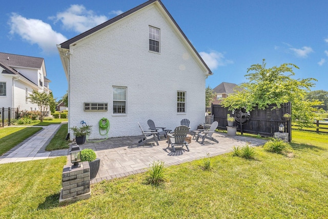 2005 Windsong Dr, Spring Hill, TN 37174 - back of property featuring brick siding and a patio area
