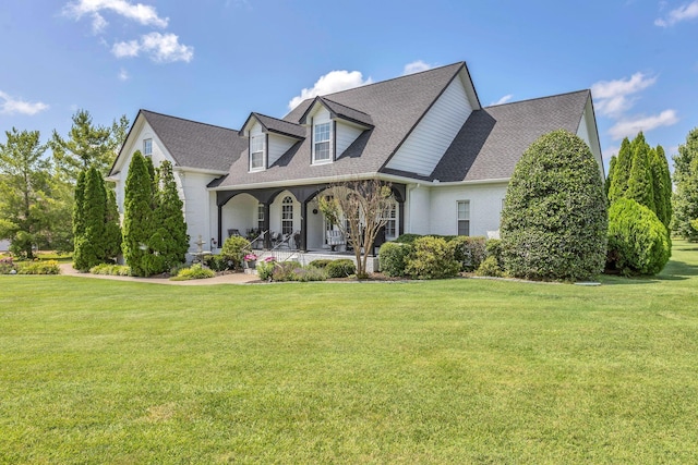 2005 Windsong Dr, Spring Hill, TN 37174 - new england style home featuring covered porch, a front yard, and roof with shingles