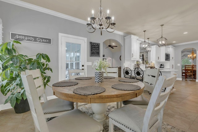 2005 Windsong Dr, Spring Hill, TN 37174 - dining room featuring a chandelier, arched walkways, crown molding, light tile patterned flooring, and a ceiling fan