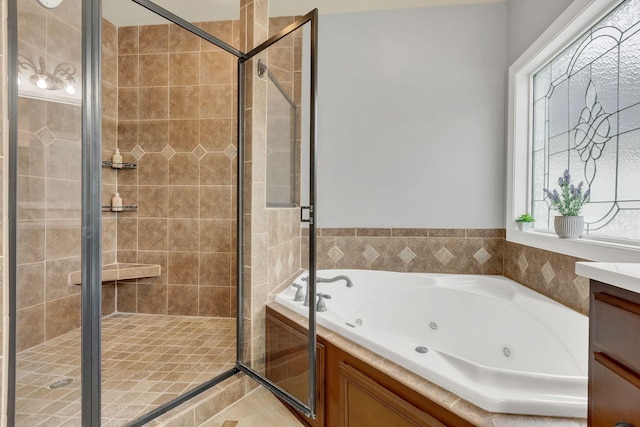 2005 Windsong Dr, Spring Hill, TN 37174 - full bathroom featuring a whirlpool tub, a shower stall, and vanity