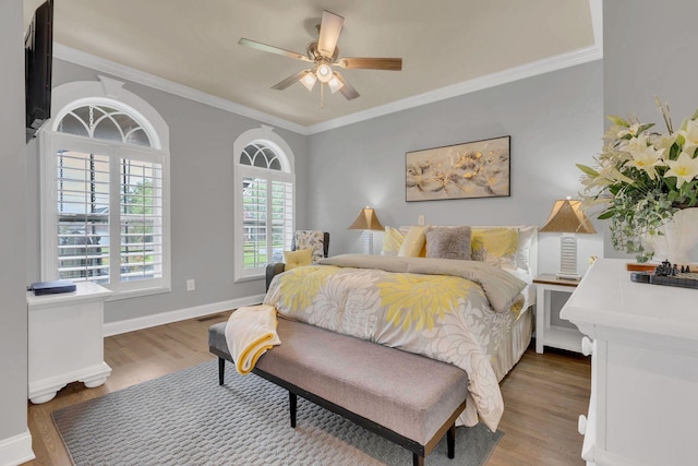 2005 Windsong Dr, Spring Hill, TN 37174 - bedroom featuring wood finished floors, ornamental molding, and a ceiling fan