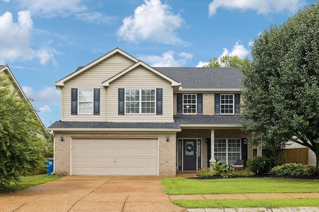 3232 Dark Woods Dr, Franklin, TN 37064 - traditional-style home featuring concrete driveway, an attached garage, brick siding, and a front lawn
