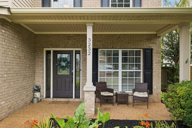 3232 Dark Woods Dr, Franklin, TN 37064 - view of exterior entry featuring brick siding and covered porch